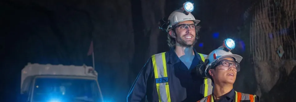 Two mining students smiling